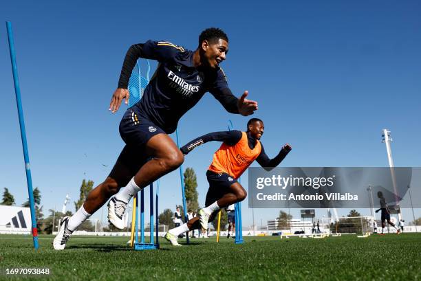 Jude Bellingham and David Alaba of Real Madrid train at Valdebebas training ground on September 23, 2023 in Madrid, Spain.