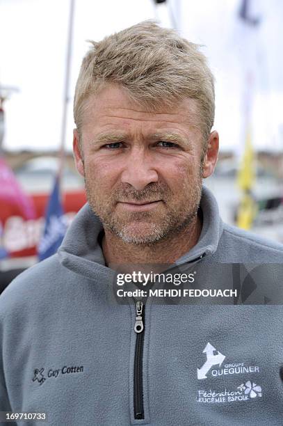 French skipper Yann Helies, winner of "La Solitaire du Figaro" race in 2012, poses aboard his monohull "Queguiner" in Bordeaux harbour, southwestern...