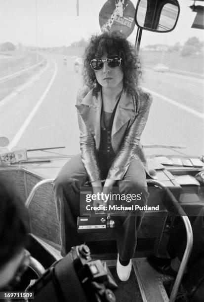 Singer Marc Bolan , of English glam rock group T-Rex, on a tour bus during a four-date British tour, June 1972.