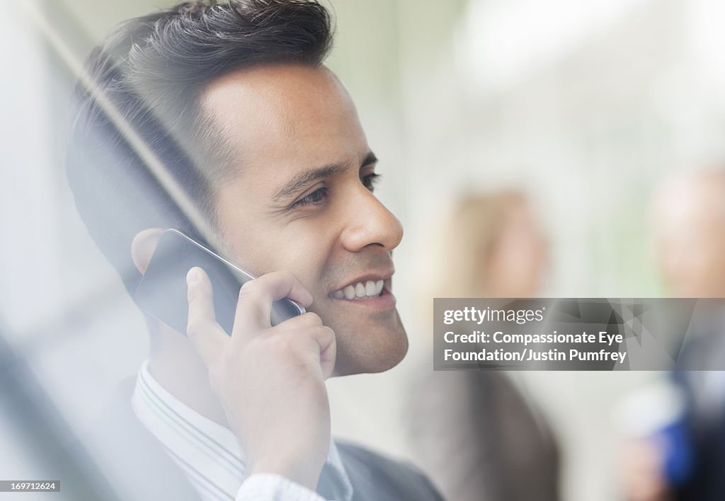 Close up of businessman using mobile phone