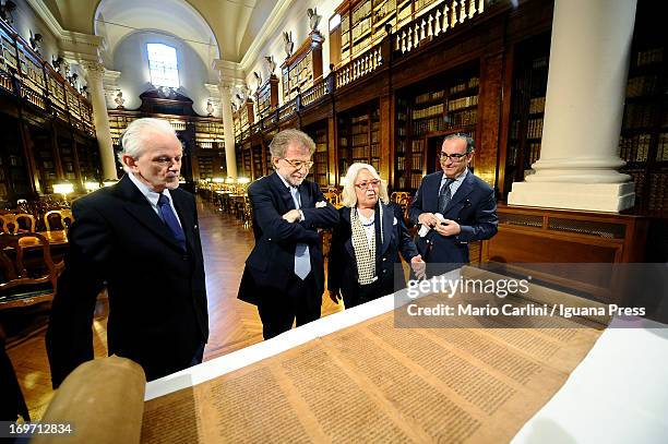 The discoverer Professor Mauro Perani, Ivano Dionigi, Rector of the University of Bologna, Biancastella Antonino, curator of the Biblioteca...