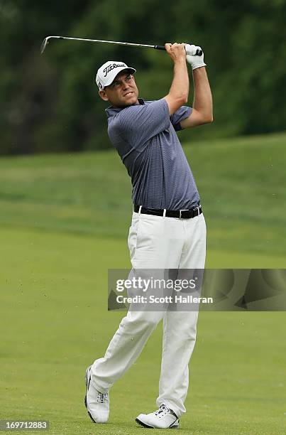 Bill Haas hits his approach shot on the 13th hole during the second round of the Memorial Tournament presented by Nationwide Insurance at Muirfield...