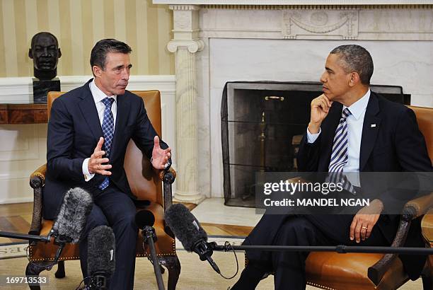 Secretary General Anders Fogh Rasmussen speaks following a meeting with US President Barack Obama in the Oval Office of the White House on May 31,...