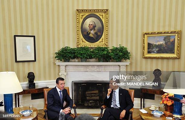 Secretary General Anders Fogh Rasmussen speaks following a meeting with US President Barack Obama in the Oval Office of the White House on May 31,...