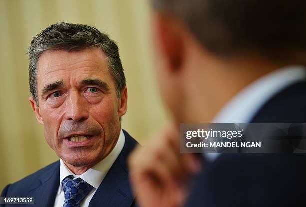 Secretary General Anders Fogh Rasmussen speaks following a meeting with US President Barack Obama in the Oval Office of the White House on May 31,...