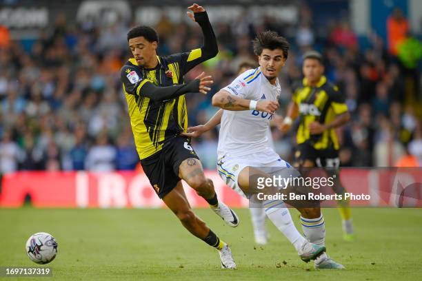 Jamal Lewis of Watford is tackled by Pascal Struijk of Leeds United during the Sky Bet Championship match between Leeds United and Watford at Elland...