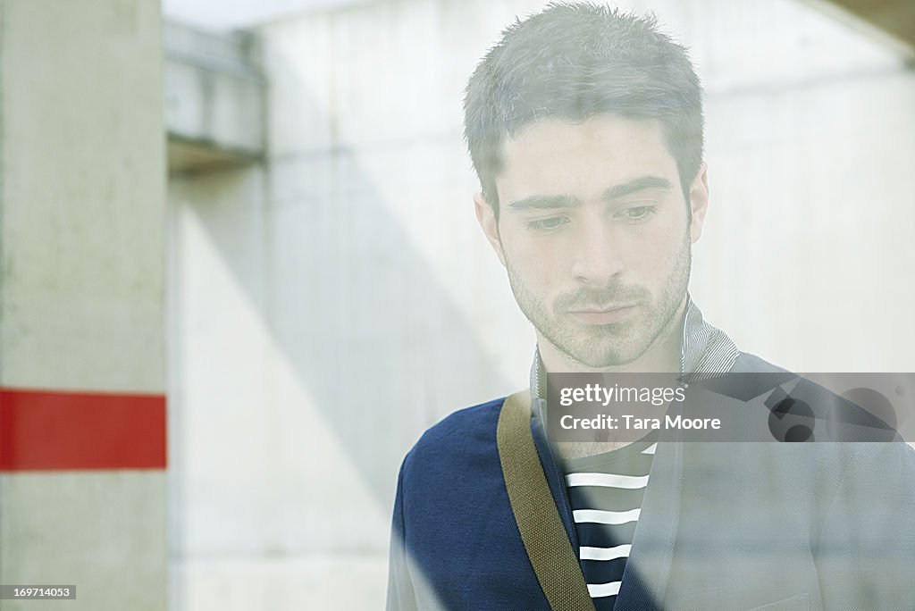 Portait of man through glass
