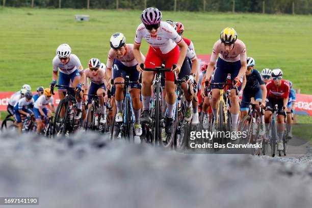 Floortje Mackaij of The Netherlands, Marta Jaskulska of Poland and Riejanne Markus of The Netherlands lead the peloton during the 29th UEC Road...