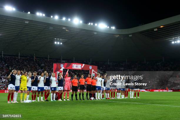 Players of both side's show support for the Spain national women's team prior to the UEFA Women's Nations League match between England and Scotland...