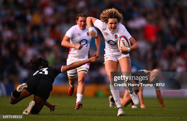 Ellie Kildunne of England looks to break past Magali Harvey of Canada during the Women's International match between England Red Roses and Canada at...