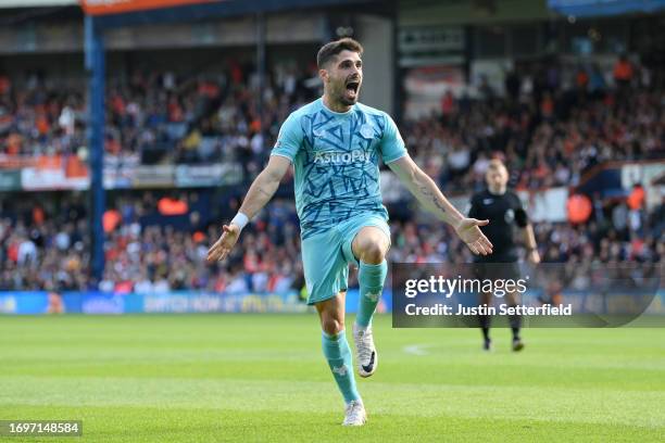Pedro Neto of Wolverhampton Wanderers celebrates after scoring their sides first goal during the Premier League match between Luton Town and...