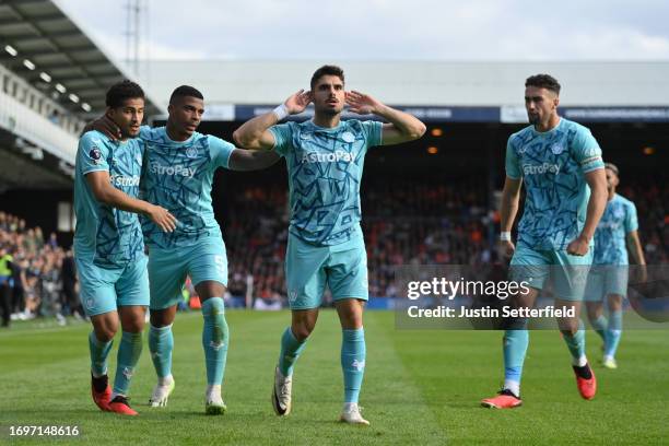 Pedro Neto of Wolverhampton Wanderers celebrates after scoring their sides first goal during the Premier League match between Luton Town and...