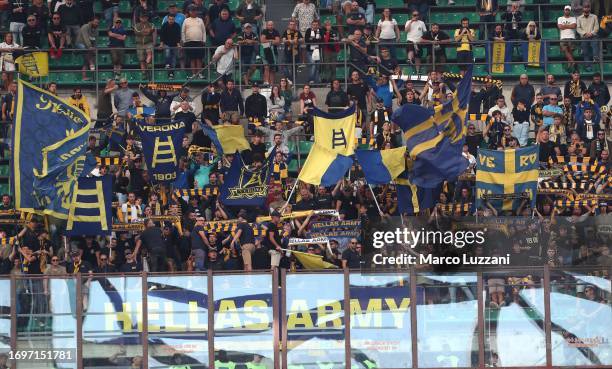 The Hellas Verona FC fans show their supportduring the Serie A TIM match between AC Milan and Hellas Verona FC at Stadio Giuseppe Meazza on September...