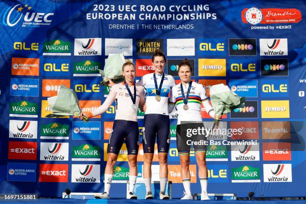 Silver medalist Lorena Wiebes of The Netherlands, gold medalist Mischa Bredewold of The Netherlands, and bronze medalist Lotte Kopecky of Belgium,...