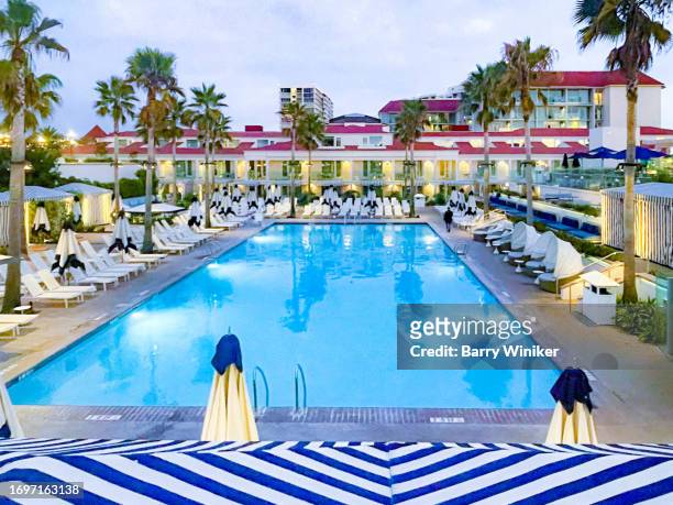 dusk view from high up of pool at the hotel del coronado - rooftop pool stock pictures, royalty-free photos & images