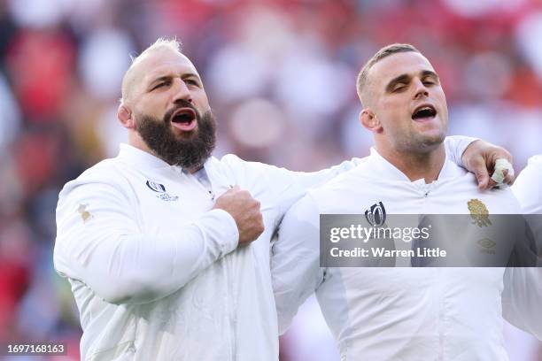 Joe Marler and Ben Earl of England sing their national anthem prior to the Rugby World Cup France 2023 match between England and Chile at Stade...