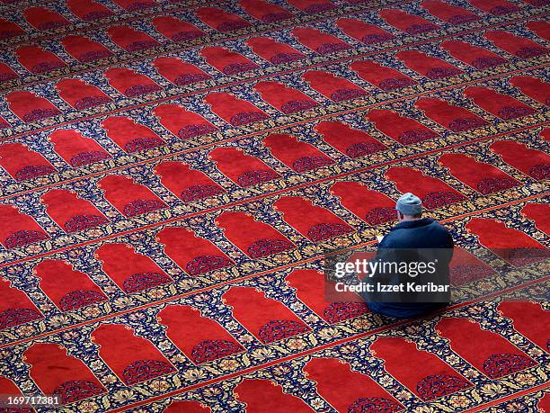 a prayer in the old mosque - moské bildbanksfoton och bilder