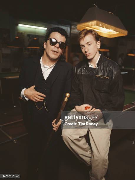 English musician Ian Dury with actor Tim Roth, circa 1986. The two appeared in the 1986 BBC television film 'King of The Ghetto'.