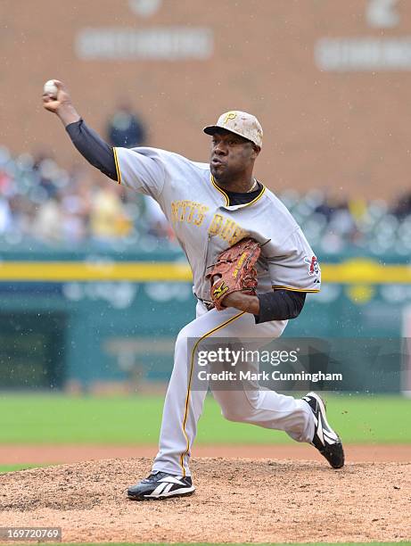 Jose Contreras of the Pittsburgh Pirates pitches while wearing a special camouflage jersey and hat to honor veterans on Memorial Day during the...