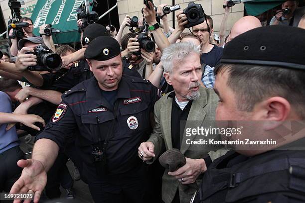 Russian riot police detain writer, opposition leader and initiator of the Strategy-31 campaign Eduard Limonov during an unsanctioned Strategy-31...