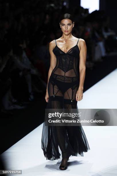Irina Shayk walks the runway at the Dolce&Gabbana fashion show during the Milan Fashion Week Womenswear Spring/Summer 2024 on September 23, 2023 in...
