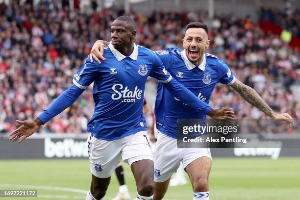 Abdoulaye Doucoure of Everton celebrates after scoring their sides first goal during the Premier League match between Brentford FC and Everton FC at...