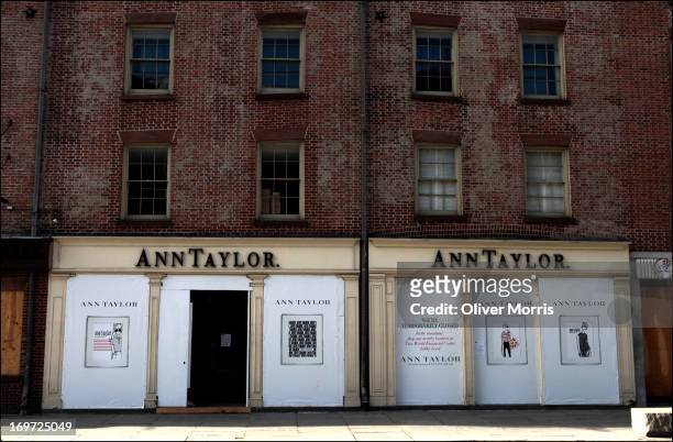 View of a boarded-up Ann Taylor clothing store, South Street Seaport, New York, New York, January 10, 2013. The store had been closed for nearly nine...