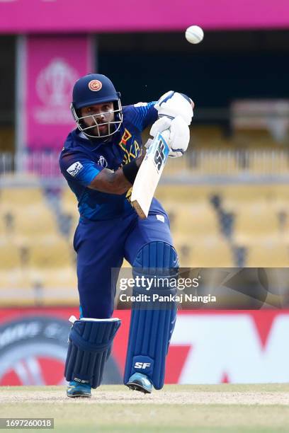 Kusal Mendis of Sri Lanka plays a shot during the Bangladesh and Sri Lanka warm-up match prior to the ICC Men's Cricket World Cup at Assam Cricket...