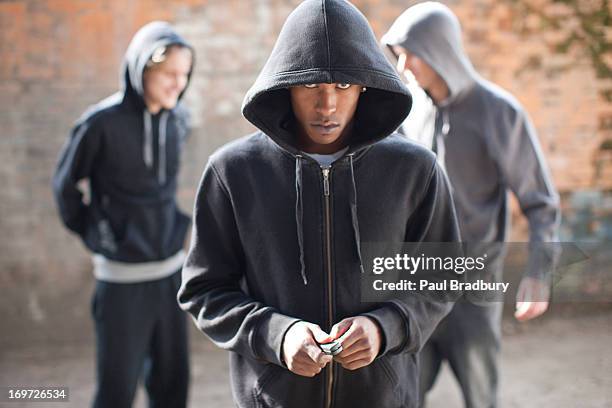 man threatening with pocket knife - thug stock pictures, royalty-free photos & images