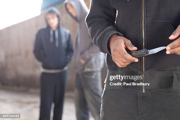 man with  knife - crime suppression stock pictures, royalty-free photos & images