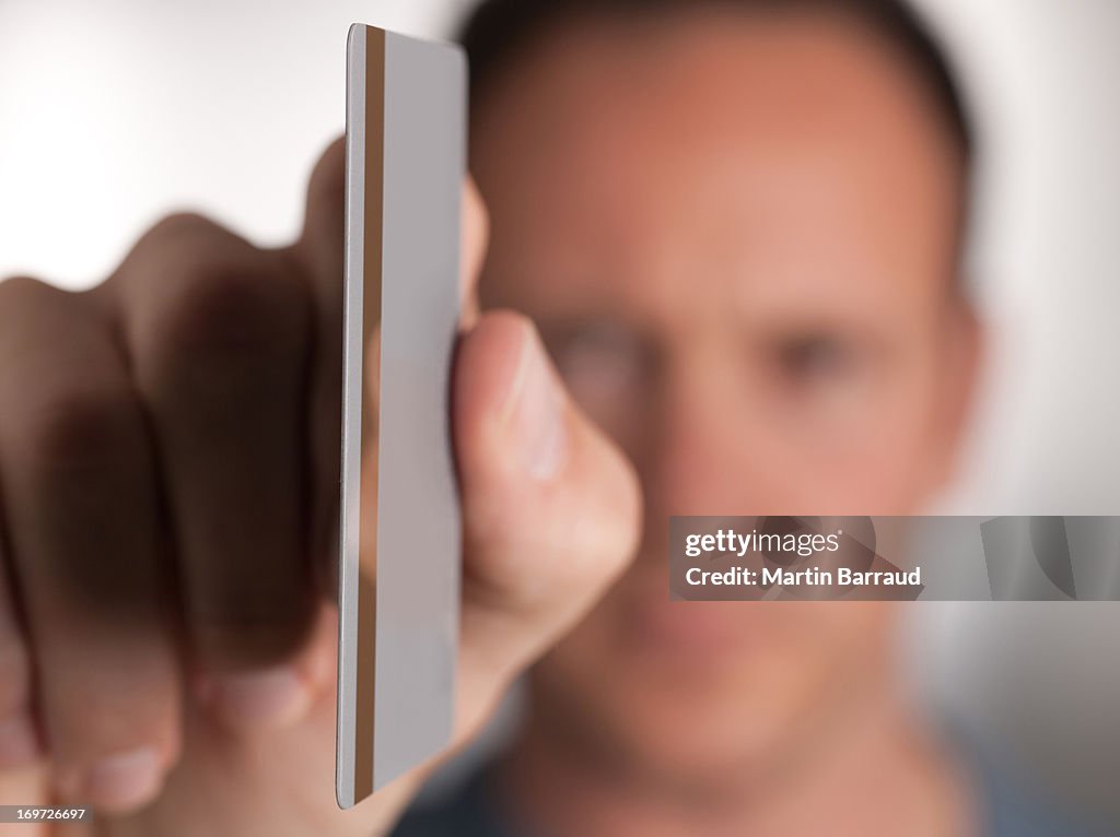 Man holding credit card