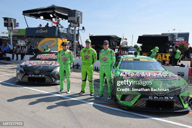 Ty Gibbs, driver of the Interstate Batteries Toyota, Trevor Bayne, Xfinity Series driver of the Interstate Batteries Toyota, and Christopher Bell,...