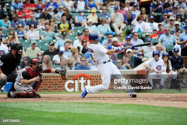 Scott Hairston of the Chicago Cubs hits a grand slam home run against the Arizona Diamondbacks during the third inning on May 31, 2013 at Wrigley...