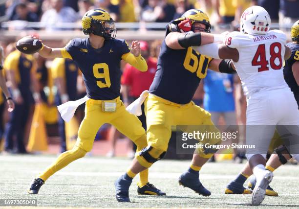McCarthy of the Michigan Wolverines throws a first half pass against the Rutgers Scarlet Knights at Michigan Stadium on September 23, 2023 in Ann...