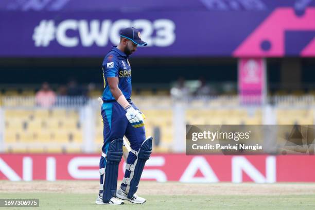 Sadeera Samarawickrama of Sri Lanka makes his way off after being dismissed during the Bangladesh and Sri Lanka warm-up match prior to the ICC Men's...