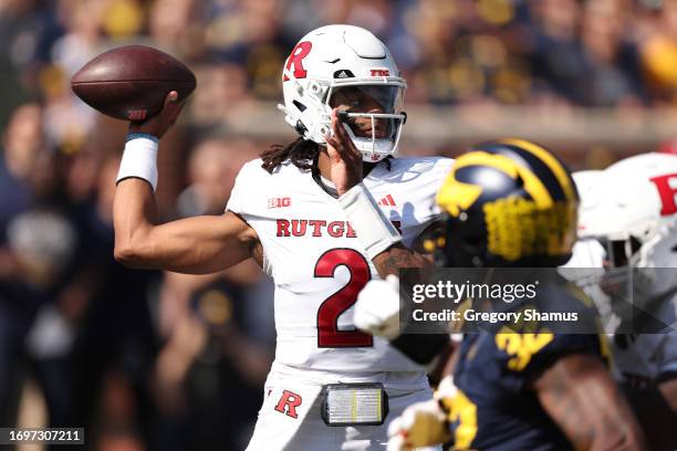 Gavin Wimsatt of the Rutgers Scarlet Knights throws a first half pass against the Michigan Wolverines at Michigan Stadium on September 23, 2023 in...