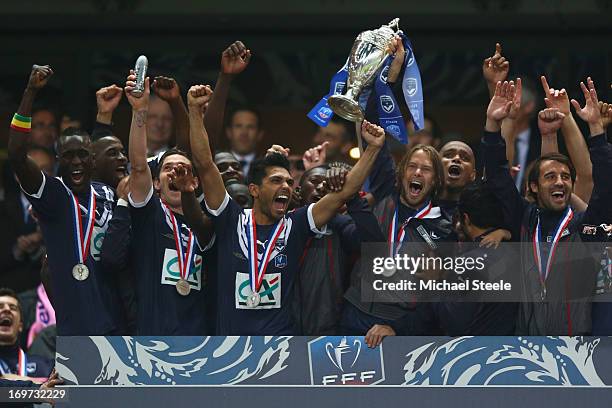 Jaroslav Plasil captain of Bordeaux lifts the winners trophy after his sides 3-2 victory in the French Cup Final match between Evian Thonon Gaillard...