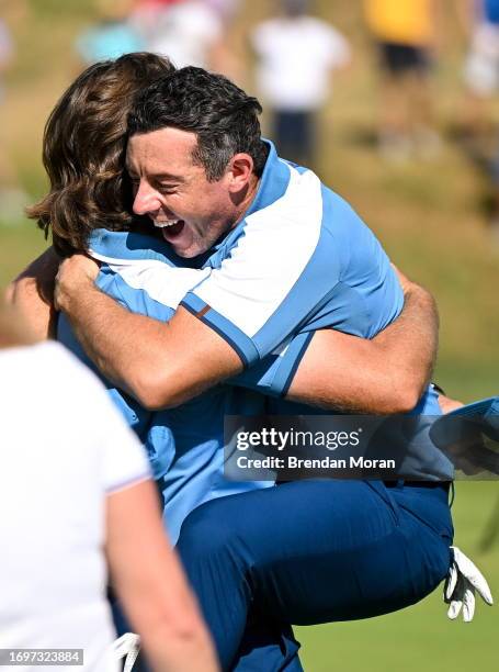 Rome , Italy - 29 September 2023; Europe's Rory McIlroy, right, and Tommy Fleetwood celebrate their pairing's victory on the 17th green during the...