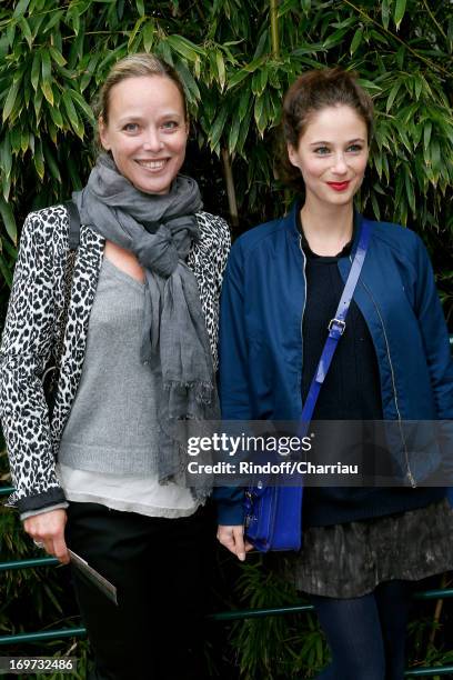 Actresses Marie Guillard and Melanie Bernier attend Roland Garros Tennis French Open 2013 - Day 6 on May 31, 2013 in Paris, France.