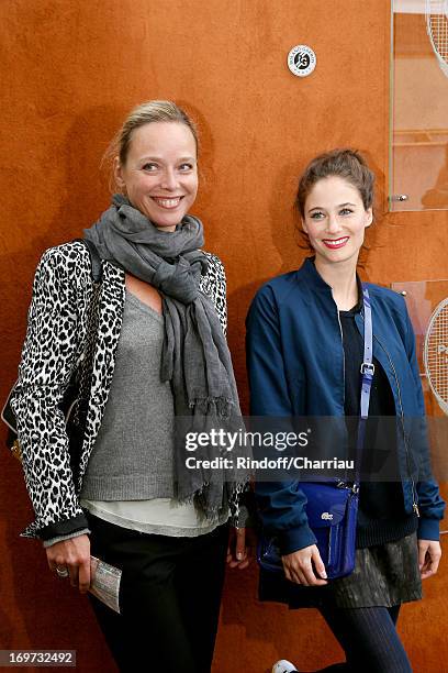 Actresses Marie Guillard and Melanie Bernier attend Roland Garros Tennis French Open 2013 - Day 6 on May 31, 2013 in Paris, France.