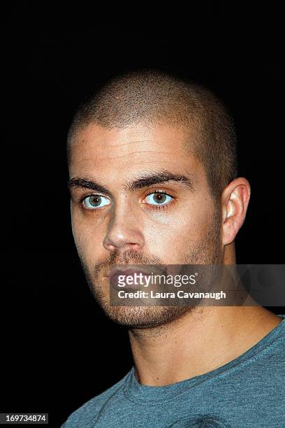 Max George of The Wanted rings The NASDAQ Stock Market Closing Bell at NASDAQ MarketSite on May 31, 2013 in New York City.