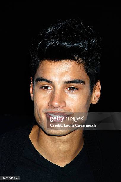 Siva Kaneswaran of The Wanted rings The NASDAQ Stock Market Closing Bell at NASDAQ MarketSite on May 31, 2013 in New York City.