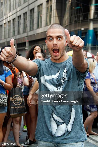 Max George of The Wanted rings The NASDAQ Stock Market Closing Bell at NASDAQ MarketSite on May 31, 2013 in New York City.