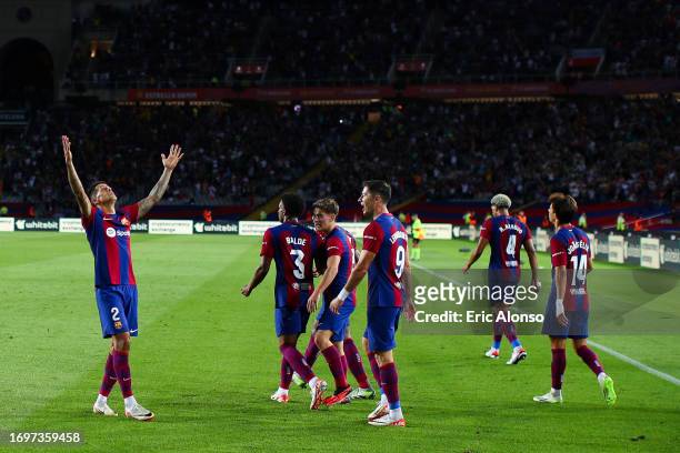 Joao Cancelo of FC Barcelona celebrates with his teammates after scoring the team's third goalduring the LaLiga EA Sports match between FC Barcelona...