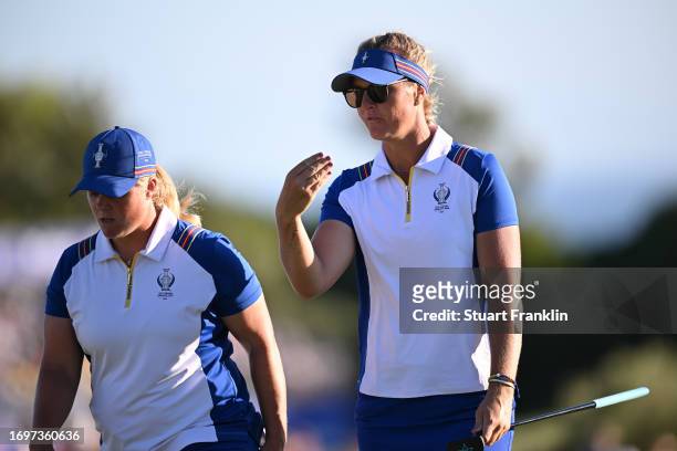 Caroline Hedwall and Vice Captain Anna Nordqvist of Team Europe walk the 17th fairway during Day Two of The Solheim Cup at Finca Cortesin Golf Club...