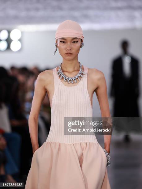 Model walks the runway at the Jil Sander fashion show during the Milan Fashion Week Womenswear Spring/Summer 2024 on September 23, 2023 in Milan,...