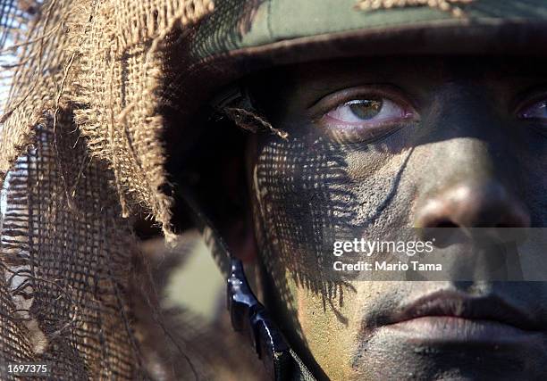 Army Infantry Private Brian Usher of Roseburg, Oregon stands during media training at the U.S. Army Infantry Center December 16, 2002 in Fort...