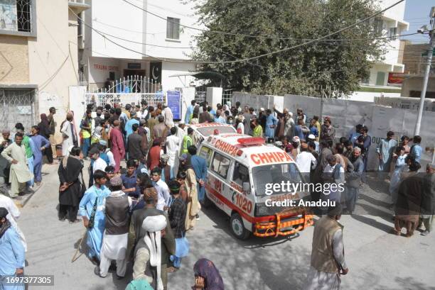 Injured citizens are brought to hospital after the attack at a procession to celebrate Eid Miladun Nabi, the birthday of Prophet Muhammad, near a...