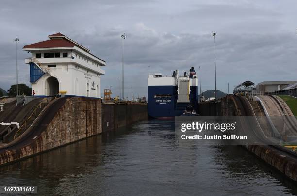 Vehicle carrier Sirius Leader passes through the Miraflores locks while transiting the Panama Canal on September 23, 2023 in Panama City, Panama. The...