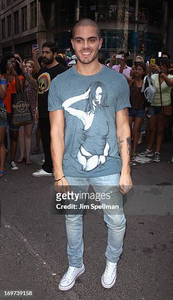 Singer Max George of The Wanted rings the closing bell at the NASDAQ MarketSite on May 31, 2013 in New York City.